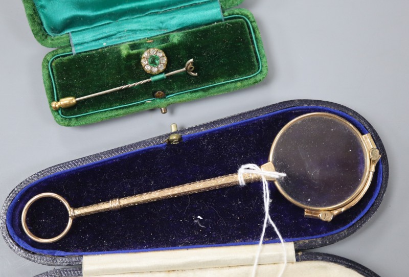 A pair of 14k gold plated lorgnettes, 14.2cm and a paste set stick pin (a.f.).